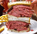 Have the classic pastrami sandwich at Katz's Delicatessen